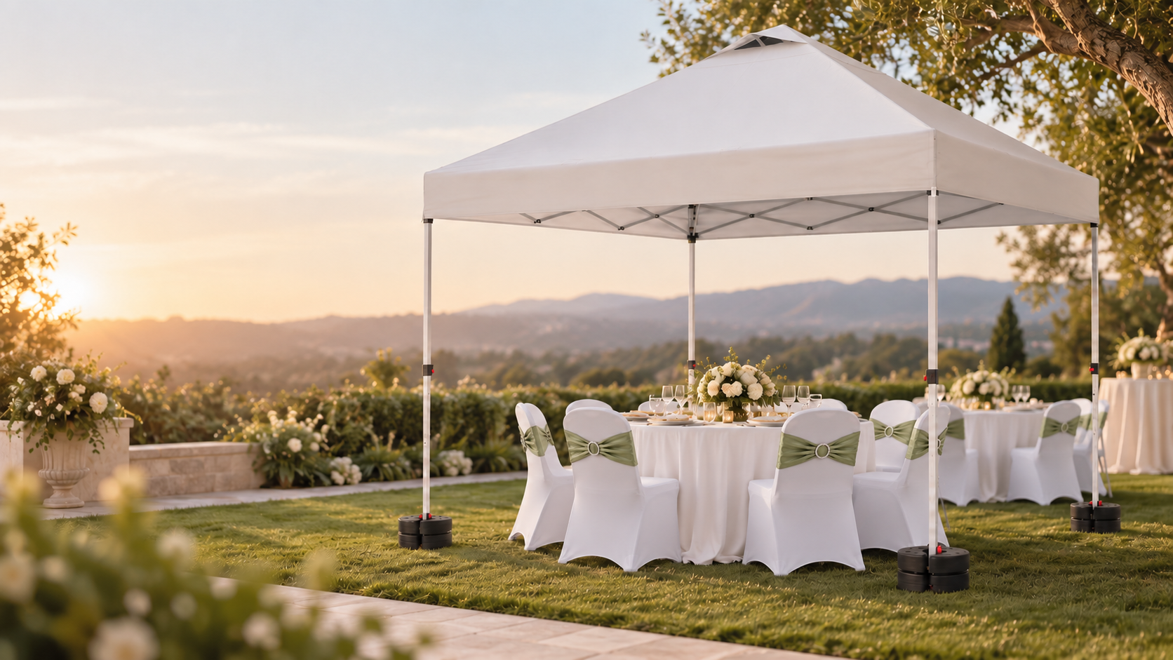 White outdoor event canopy with covered chairs and dressed tables